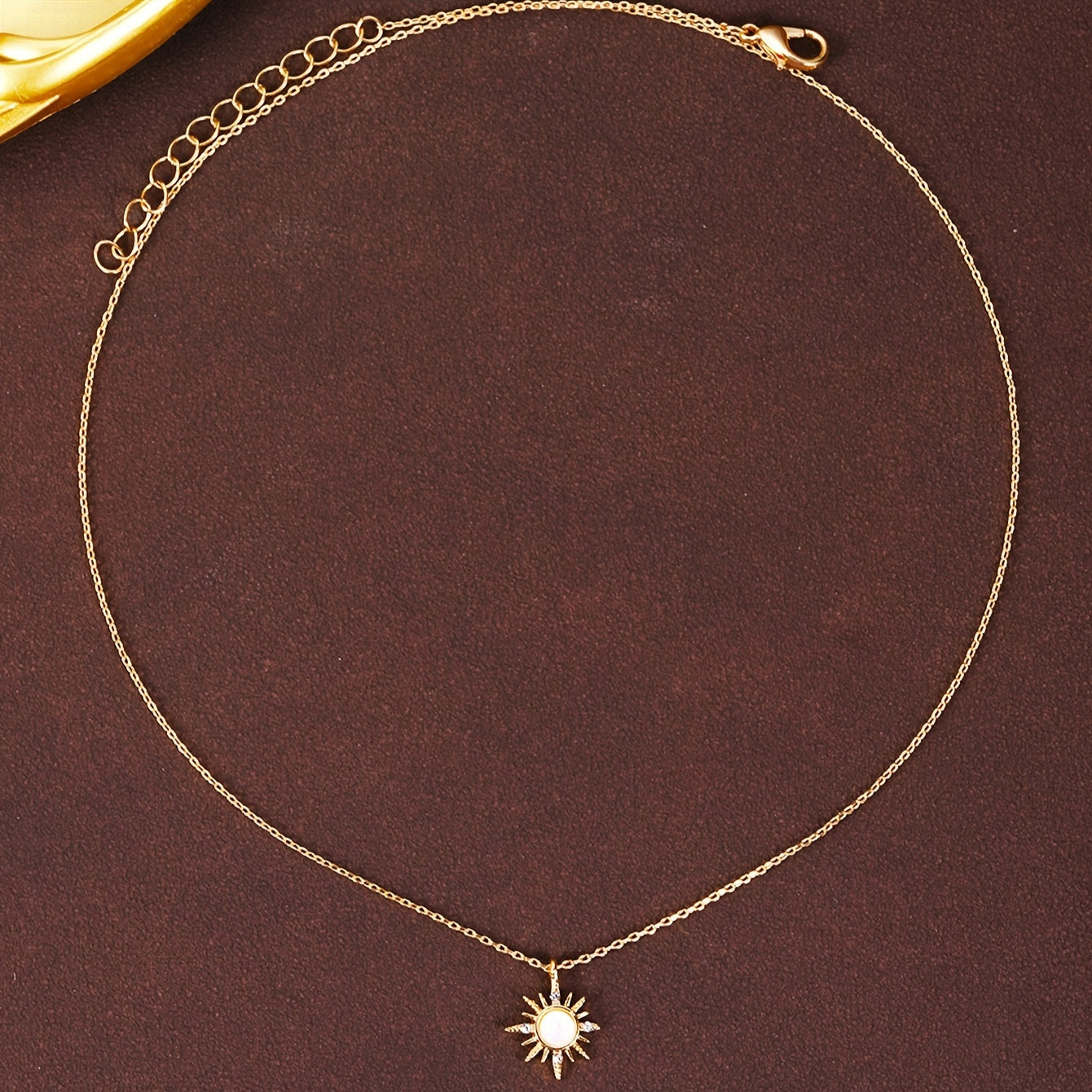 Elegant 18K Golden Plated Copper Pendant Necklace with Rhinestone Sunburst Star Design